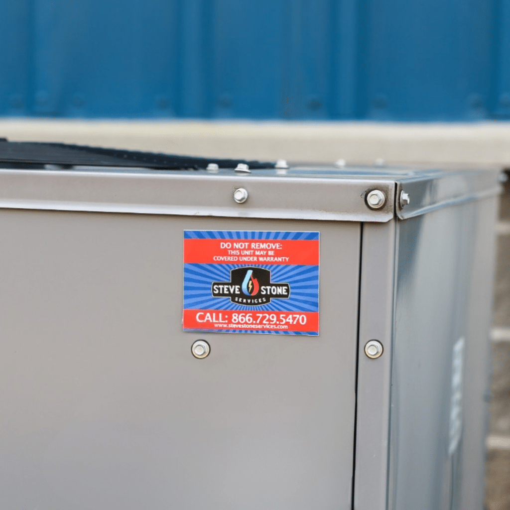 Rectangular HVAC warranty sticker on equipment reading “Do Not Remove”
