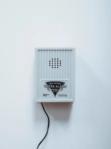Water alarm hanging on the wall