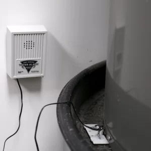 Water alarm with sensor in hot water heater pan