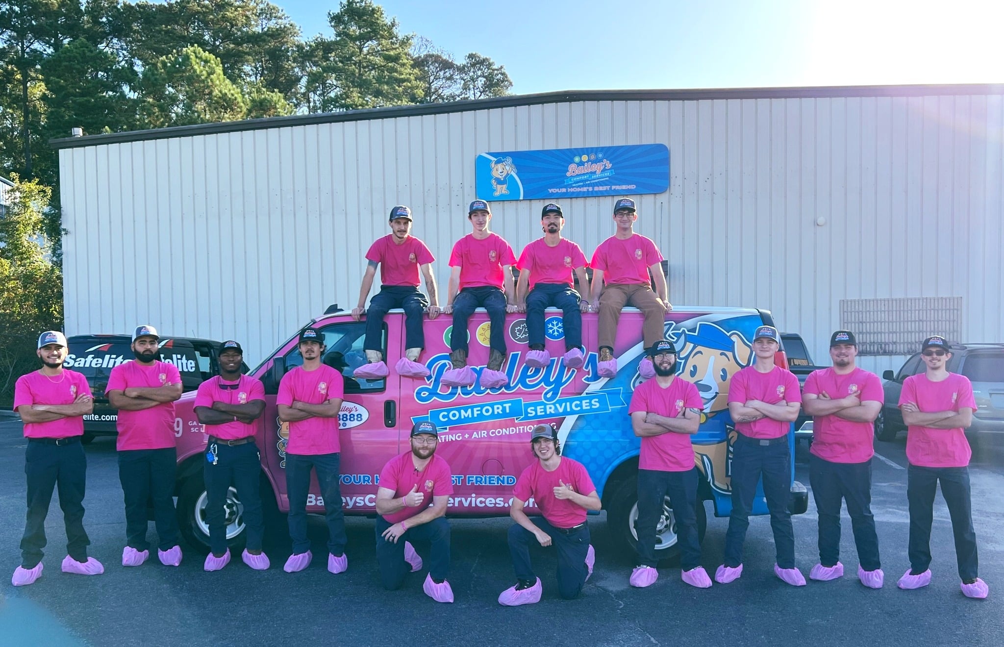 Large group wearing pink for Covered For The Cause